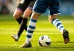 jogadores de futebol pernas