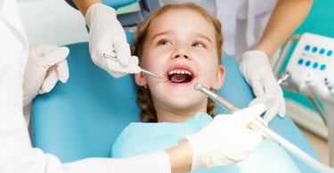 criança no dentista Saúde Oral