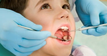 criança no dentista Saúde Oral