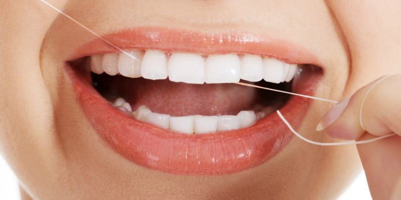 utilização de fio dentário