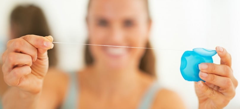 utilização de fio dentário