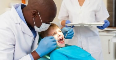 criança no dentista Saúde Oral