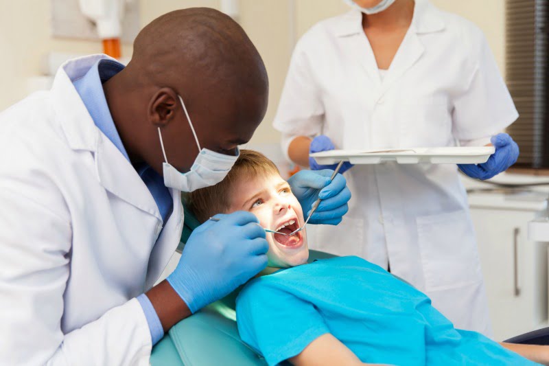 criança no dentista Saúde Oral