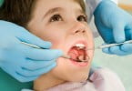 criança no dentista Saúde Oral