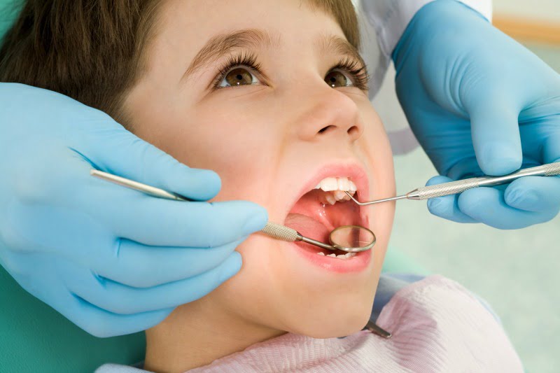 criança no dentista Saúde Oral