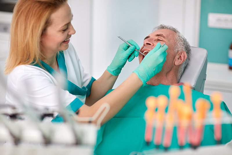 pessoa no dentista Saúde Oral