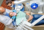 pessoa no dentista Saúde Oral