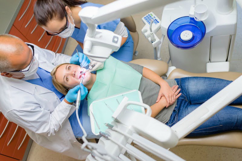 pessoa no dentista Saúde Oral