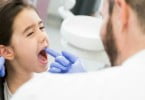 criança no dentista Saúde Oral