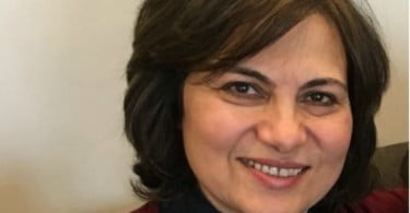 Iman Bugaighis médica dentária ativista Saúde Oral