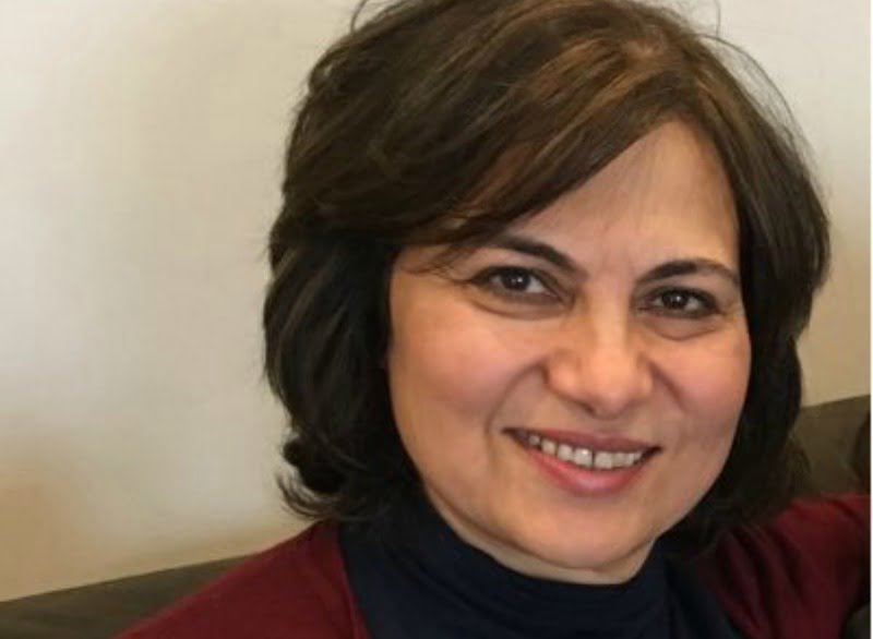 Iman Bugaighis médica dentária ativista Saúde Oral
