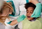 criança no dentista Saúde Oral