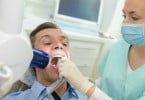 pessoa no dentista Saúde Oral