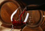 Vinho tinto: a nova arma contra as doenças da gengiva e cáries?